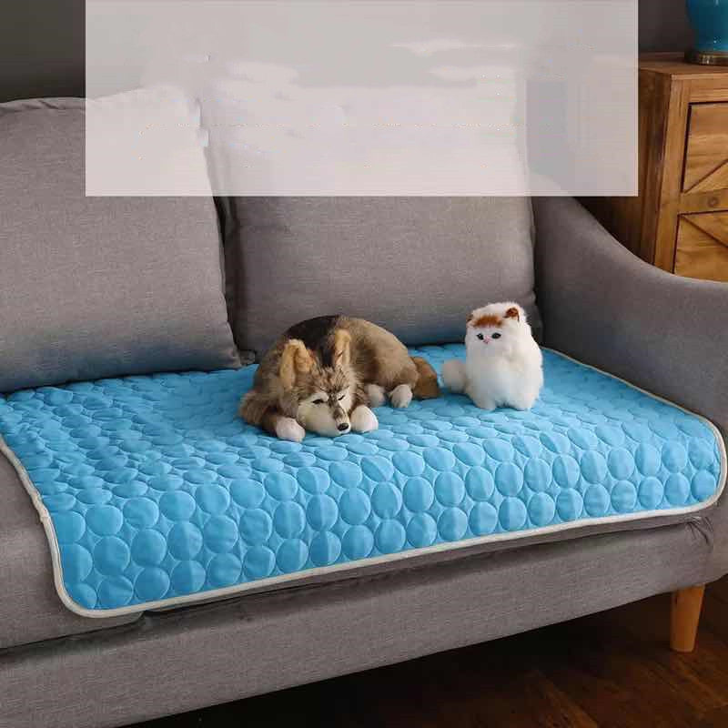 Summer Cooling Mats Blanket Ice Bed for dogs and cats in light blue with breathable quilted design. Ideal for keeping pets cool and comfortable.