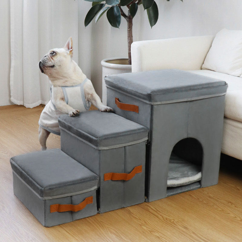 Foldable Pet Storage Stairs Dog Steps Ladder in gray with 3-step zipper design, used by a cat and filled with plush toys in a cozy bedroom setting.