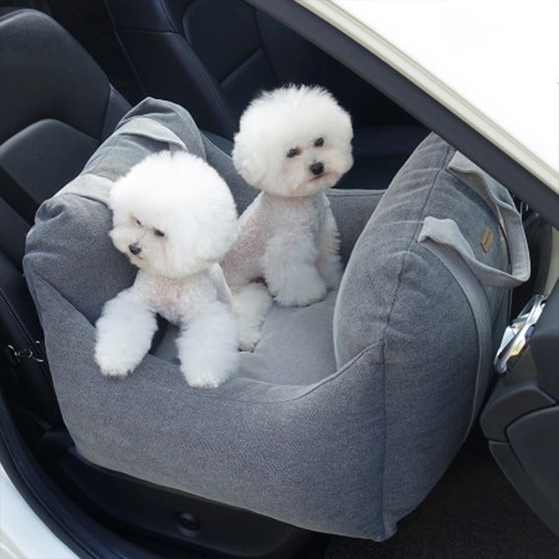 Pet Dog Car Carrier Seat Waterproof Basket in beige with two small white dogs seated inside, designed for safe and breathable pet travel.
