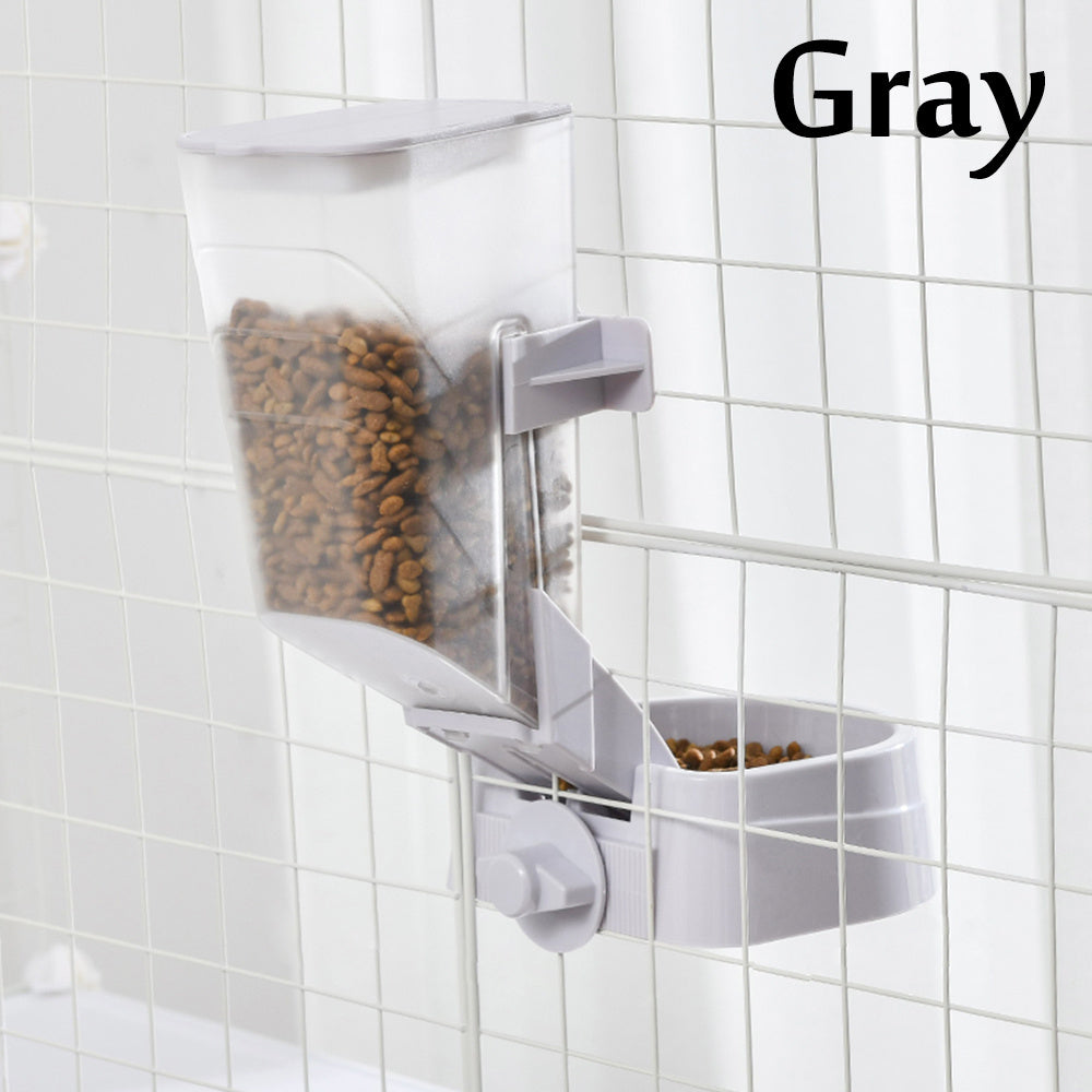 Blue suspended automatic feeder for cats and dogs mounted on a cage, featuring a transparent 2L container and bottom food tray.