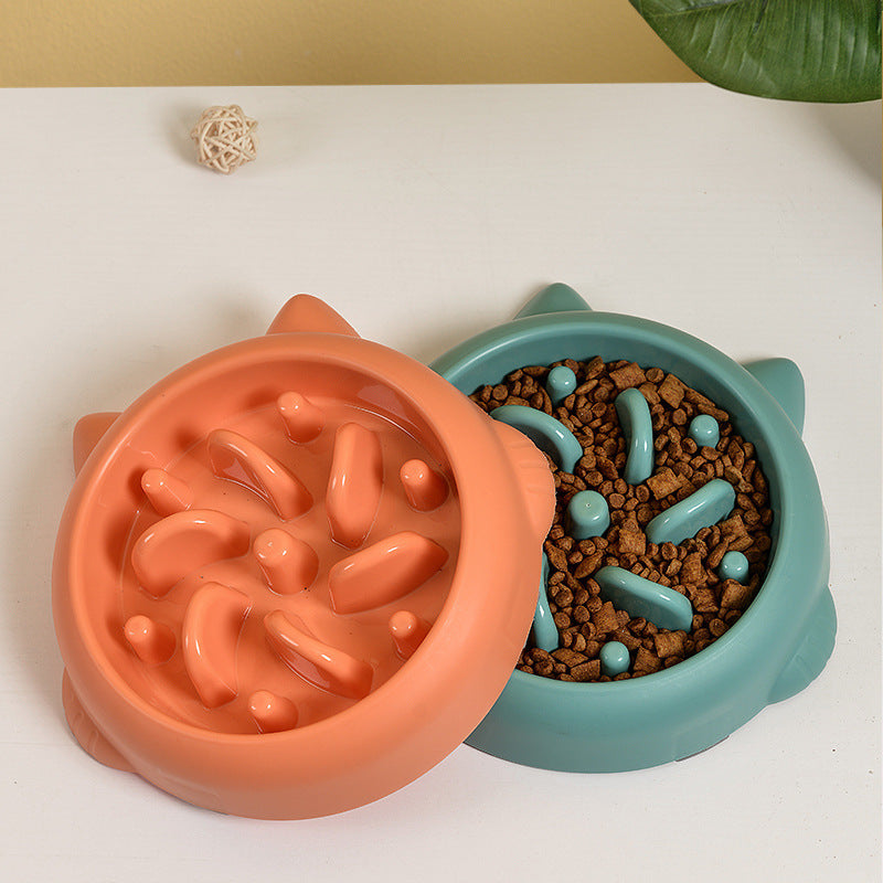 Pet Dog Cat Slow Feeder Bowls in pink, orange, and teal with anti-choking design for slow eating and bloat prevention at home.